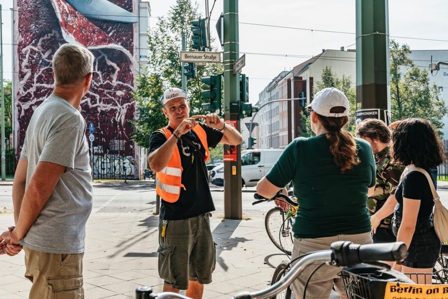 Berlin: Cold War Era History Guided Bike Tour - Checkpoint Charlie: Cold War symbolism you can actually see and ride past