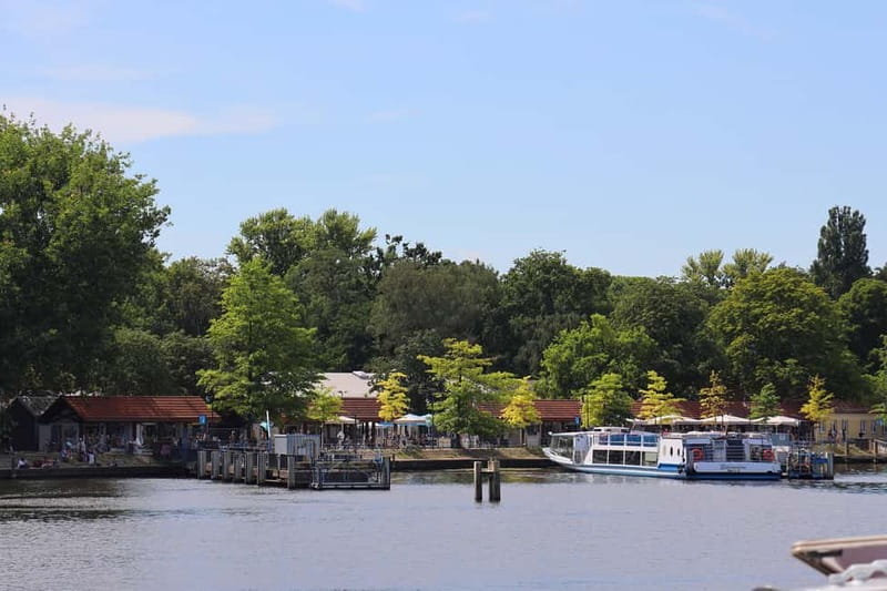 Berlin: East Side Gallery Spree Cruise in a Solar Catamaran - Treptower Park, open greenery, and harbor views that slow your day down