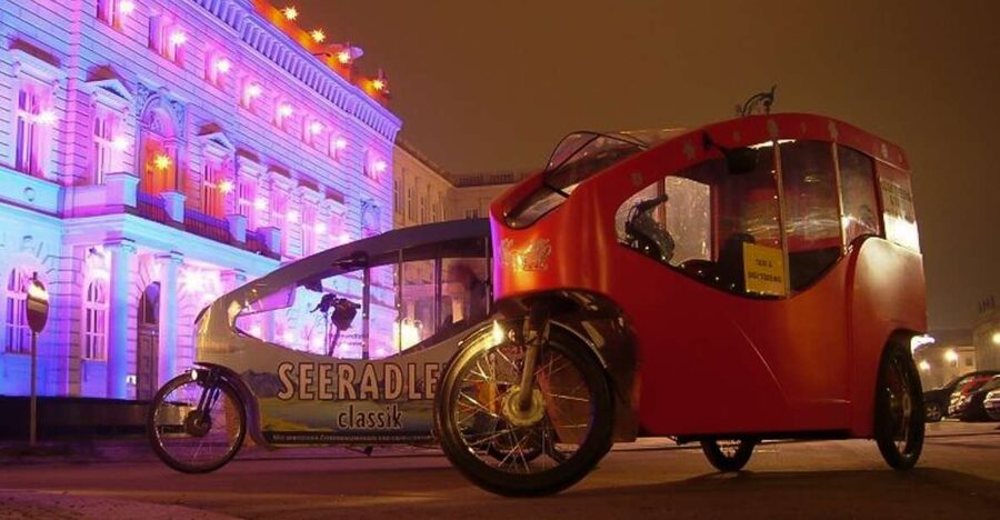 Berlin Express: Private 1-Hour E-Rickshaw Ride - Your guide maps the route, from Brandenburg Gate to riversides