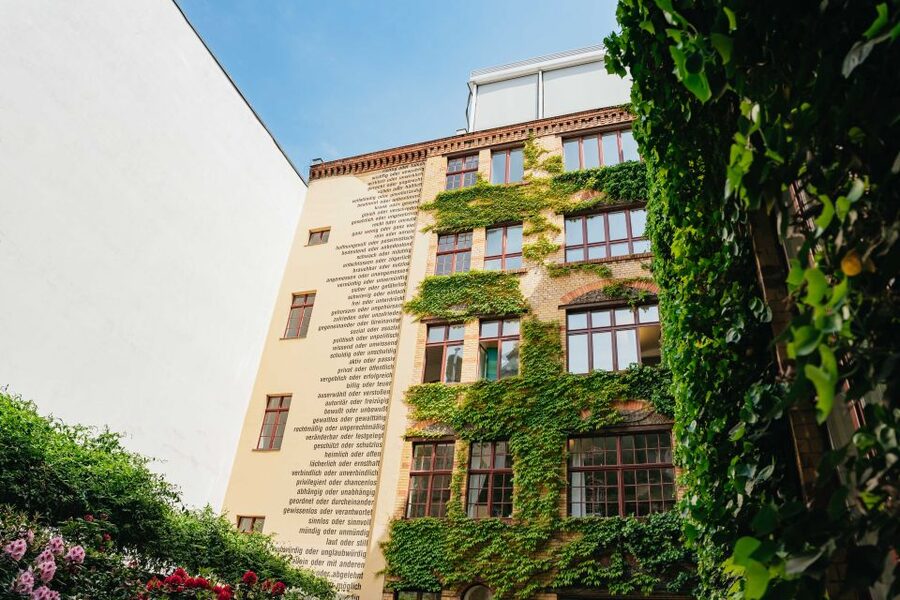 Berlin: Hidden Backyards Guided Walking Tour - Heckmann Höfe: a 19th-century courtyard that feels like a hidden pause button