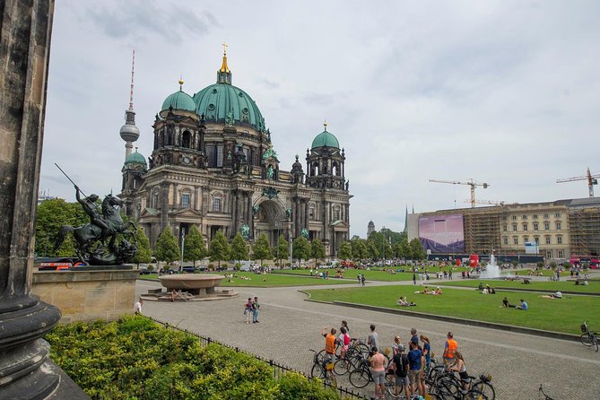 Berlin Highlights Sightseeing Bike Tour in Small Groups - Reichstag Building and the Holocaust Memorial: Serious Stops, Managed Pace