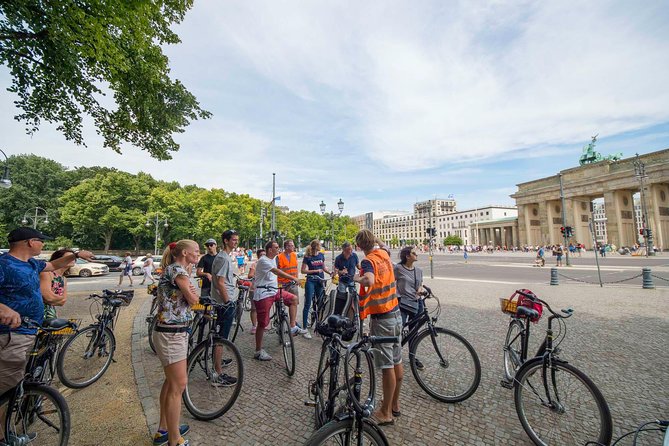 Berlin Highlights Sightseeing Bike Tour in Small Groups - Checkpoint Charlie: Where the Wall Story Becomes Street-Level