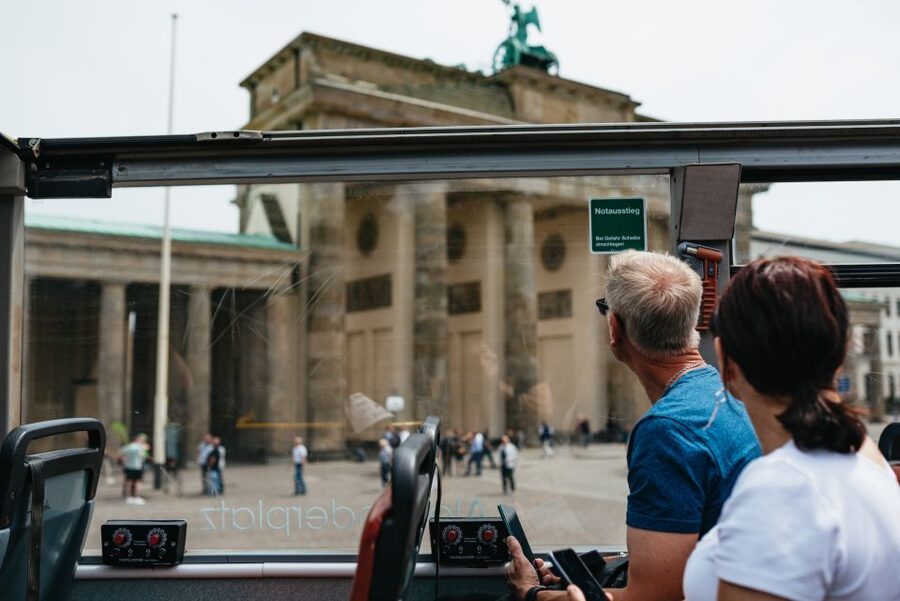 Berlin: Hop-on Hop-off Bus Tour with Live Commentary - Brandenburg Gate to the Reichstag: government district views without the guesswork