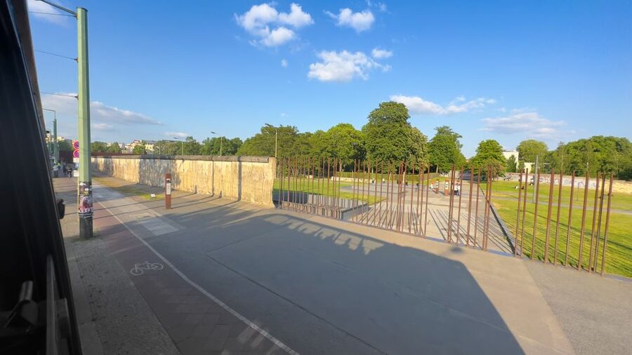 Berlin: Live-Guided Evening Sightseeing Tour by Open-top Bus - Berlin Wall Memorial, Mauer Park, and the meaning behind the night