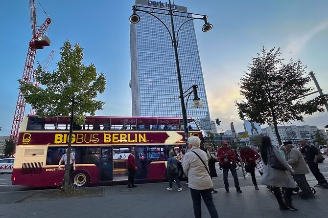 Big Bus Berlin Panoramic Night Tour by Open-Top Bus - Alexanderplatz start point and the TV Tower area glow