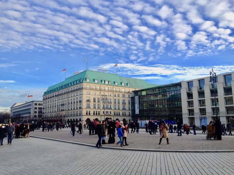 Private Taxi Tour through Berlin East and West and Kiez 4-6h - From Alexanderplatz to Karl-Marx-Allee, then the East Side story in full color